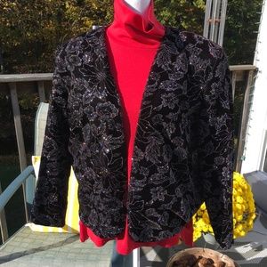 Vintage Personal Image size 16 black velvet jacket w/ a glittery floral pattern.